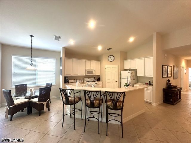 1634 Tarpon Bay DR S 202, Naples, FL 34119