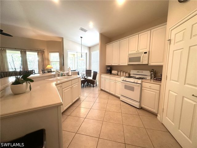 1634 Tarpon Bay DR S 202, Naples, FL 34119