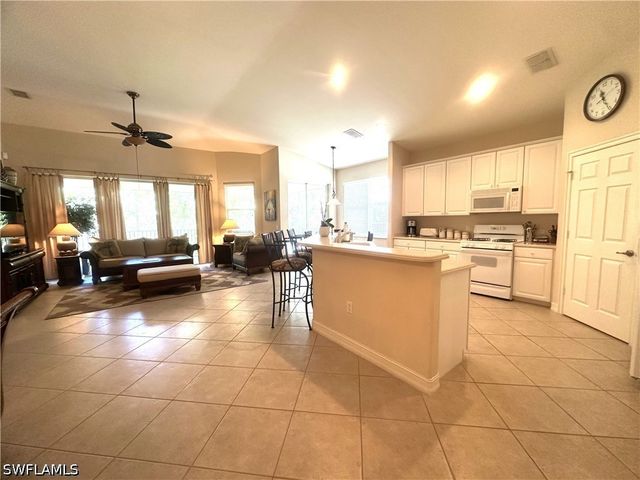 1634 Tarpon Bay DR S 202, Naples, FL 34119
