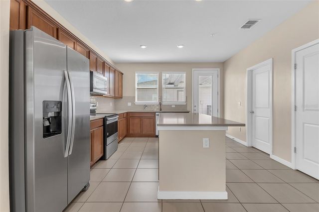 9744 BROWN BURROW STREET, Orlando, FL 32829