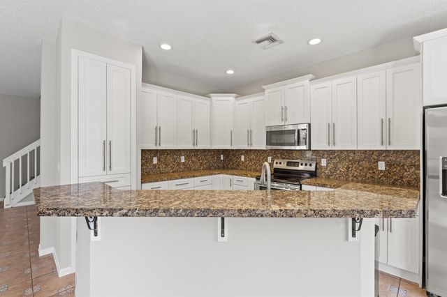 7842 Springfield Lake Drive, Lake Worth, FL 33467