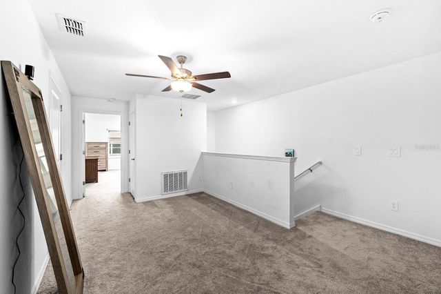 10305 TRUMPET HONEYSUCKLE WAY, San Antonio, FL 33576