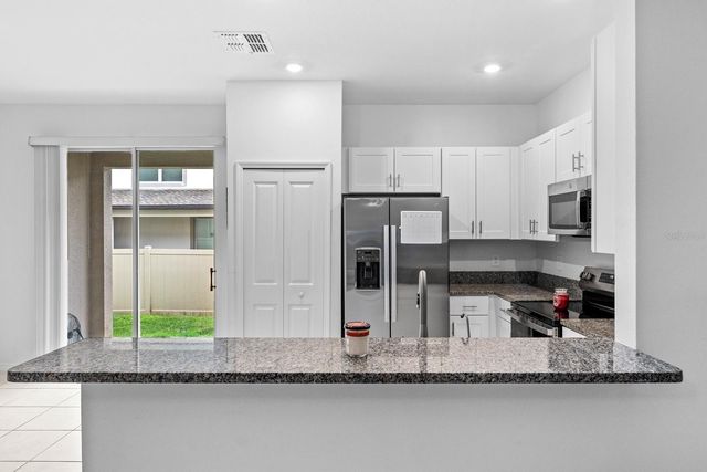 10305 TRUMPET HONEYSUCKLE WAY, San Antonio, FL 33576