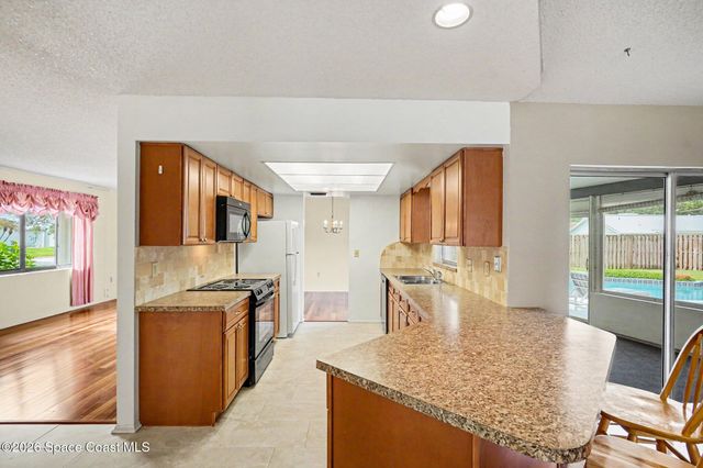 2608 Woodsmill Drive, Melbourne, FL 32934