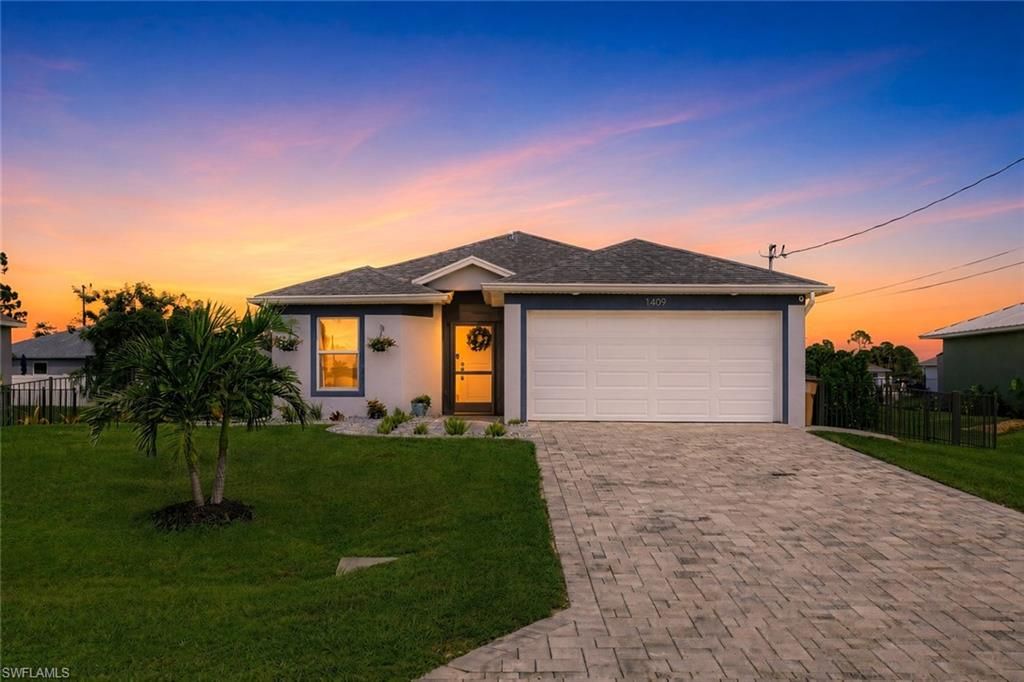 1409 NE 43rd TER, CAPE CORAL, FL 33909 — exterior