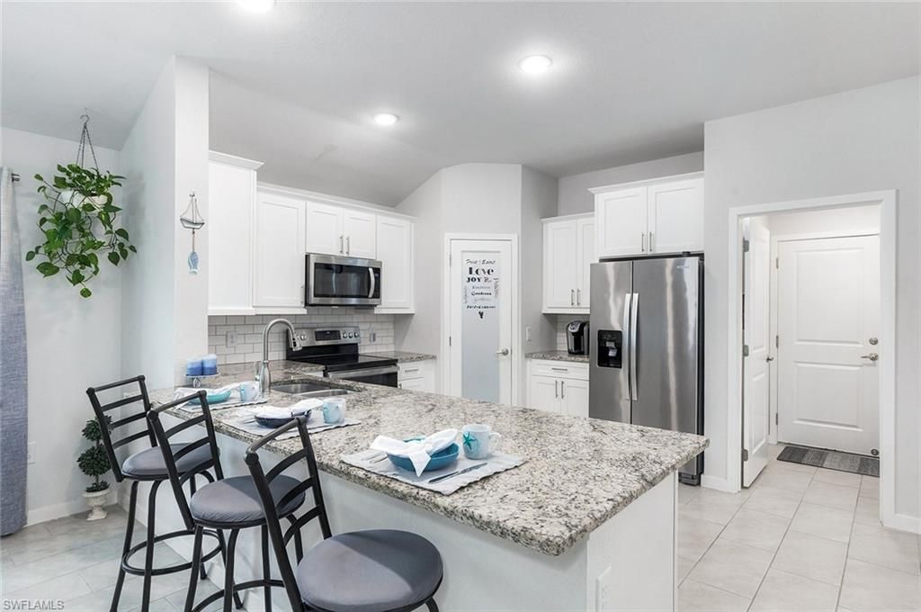 1409 NE 43rd TER, CAPE CORAL, FL 33909 — photo 5