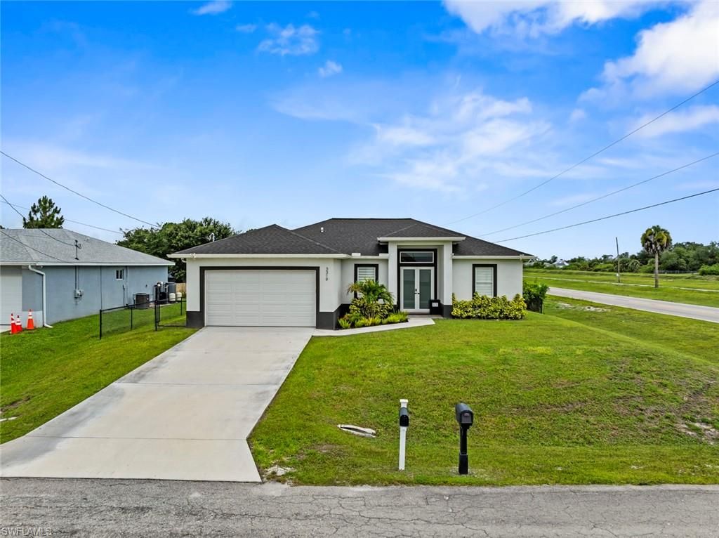 3319 21st ST W, LEHIGH ACRES, FL 33971 — photo 2