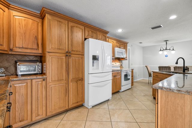2081 SE SOUTH BUTTONWOOD Drive, Port St. Lucie, Port St Lucie, FL 34952