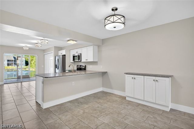 4910 Cougar CT N 1-103, Naples, FL 34109