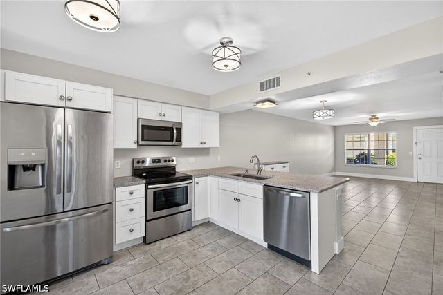 4910 Cougar CT N 1-103, Naples, FL 34109