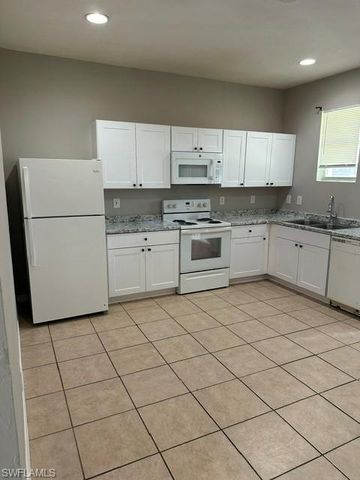 124 Pine LN, Lehigh Acres, FL 33973