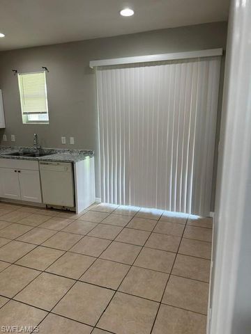 124 Pine LN, Lehigh Acres, FL 33973