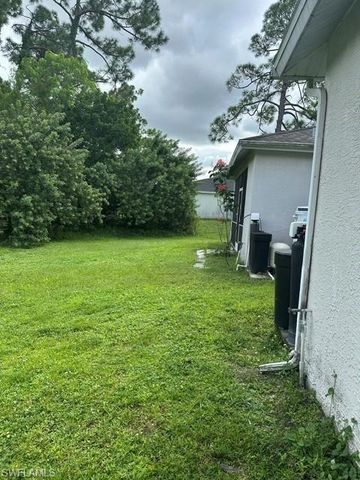 124 Pine LN, Lehigh Acres, FL 33973