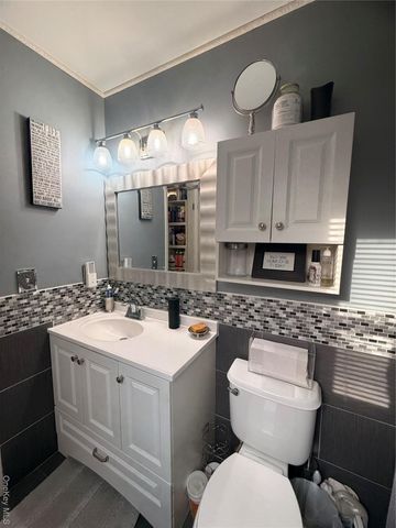 2712 Schleigel Boulevard, Amityville, NY 11701