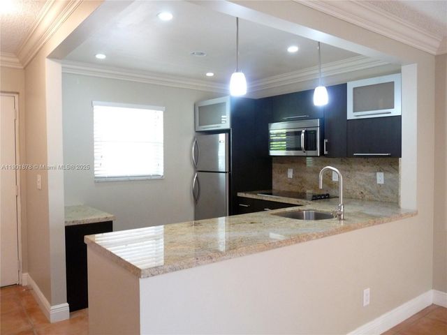 7701 Camino Real A202, Miami, FL 33143