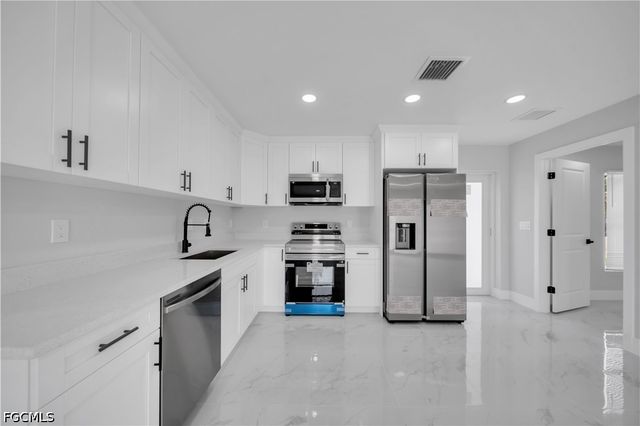 2604 51st ST SW, Lehigh Acres, FL 33976