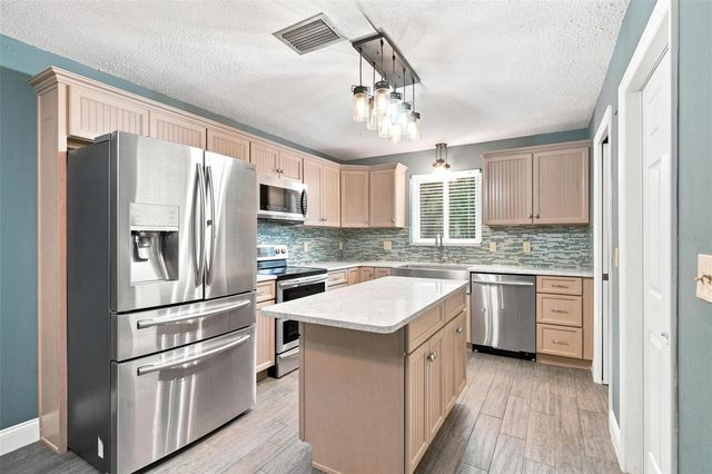 5118 MAGNOLIA TERRACE, Fruitland Park, FL 34731