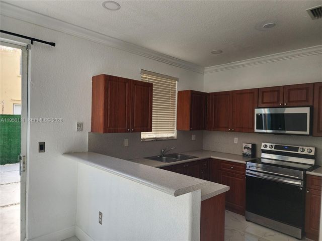 6970 NW 177th St M103, Hialeah, FL 33015