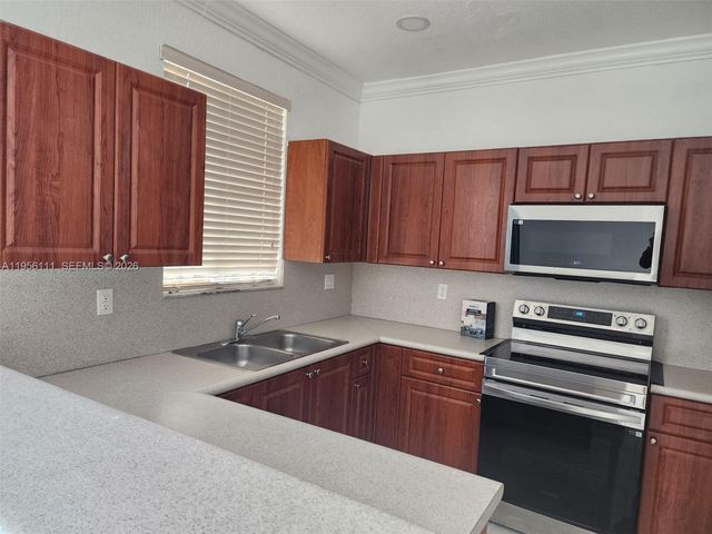 6970 NW 177th St M103, Hialeah, FL 33015