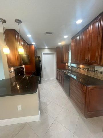 132 Bobwhite Road, Royal Palm Beach, FL 33411