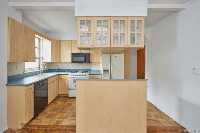 6157 77th Place, Middle Village, NY 11379