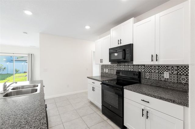 7310 PEARLY EVERLASTING AVENUE, Tampa, FL 33619