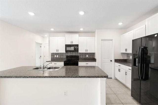 7310 PEARLY EVERLASTING AVENUE, Tampa, FL 33619