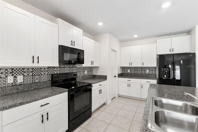 7310 PEARLY EVERLASTING AVENUE, Tampa, FL 33619