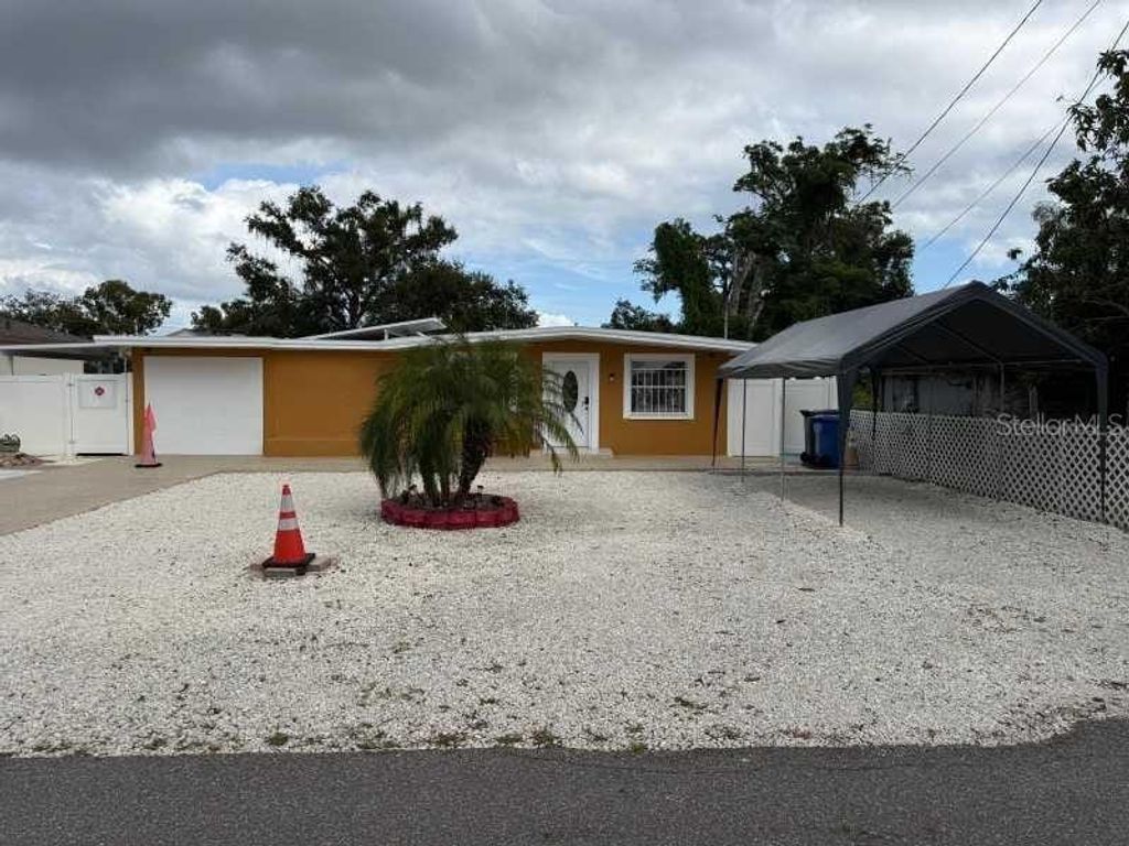 7409 N TAMPANIA AVENUE, Tampa, FL 33614