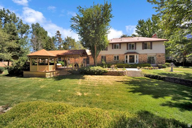 4 ROLLINGWOOD LN, Sandy, UT 84092
