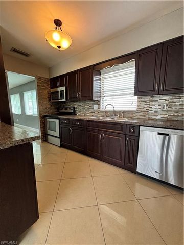 209 Punta Alta CT, Lehigh Acres, FL 33936