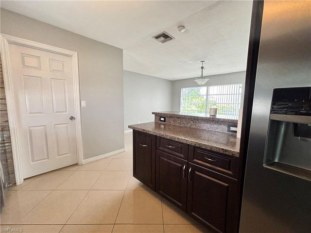 209 Punta Alta CT, Lehigh Acres, FL 33936