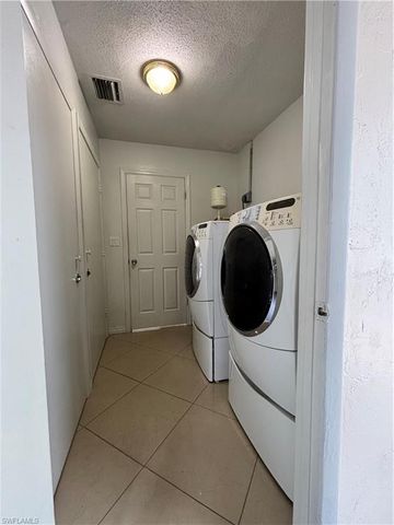 209 Punta Alta CT, Lehigh Acres, FL 33936