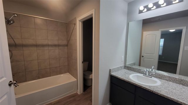 15027 Sorrento Bay Court, Willis, TX 77318