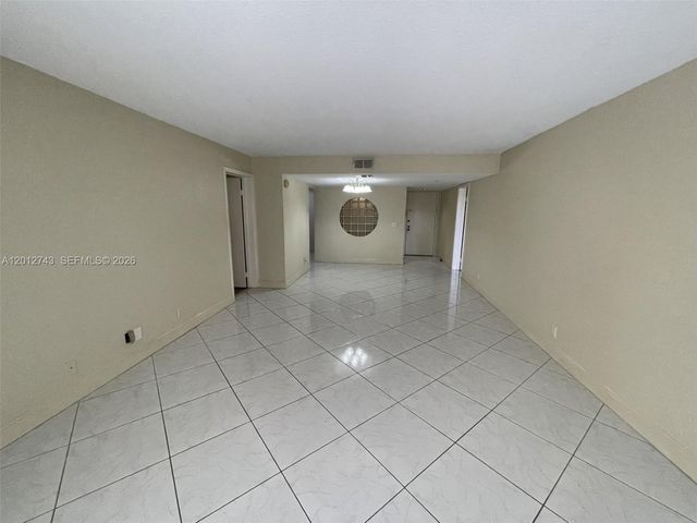 491 Racquet Club Rd 303, Weston, FL 33326