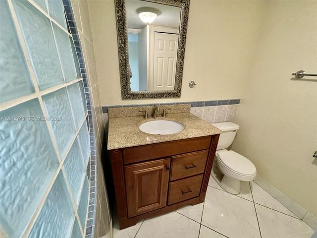 491 Racquet Club Rd 303, Weston, FL 33326