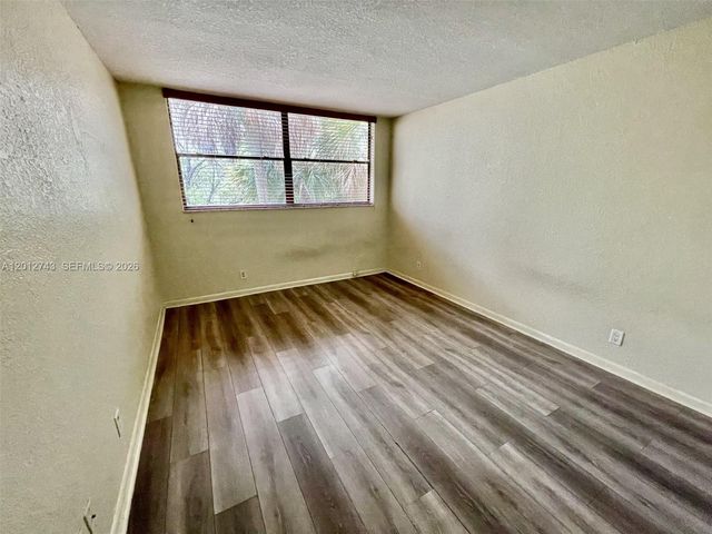 491 Racquet Club Rd 303, Weston, FL 33326