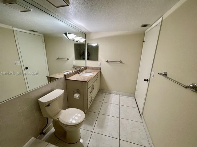 491 Racquet Club Rd 303, Weston, FL 33326