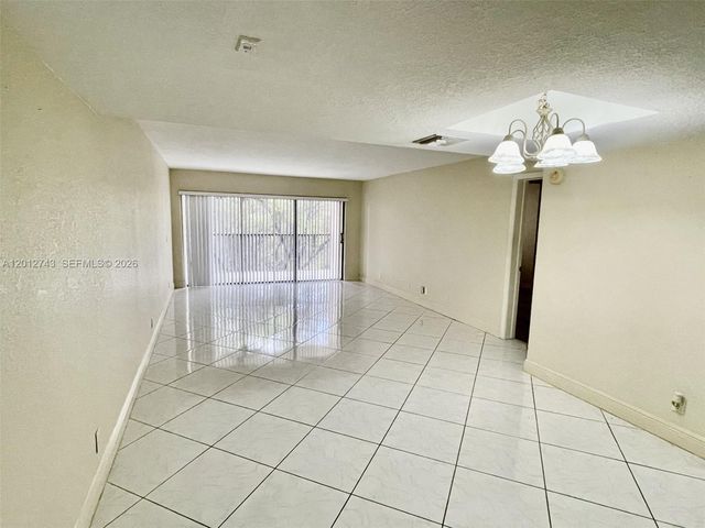 491 Racquet Club Rd 303, Weston, FL 33326
