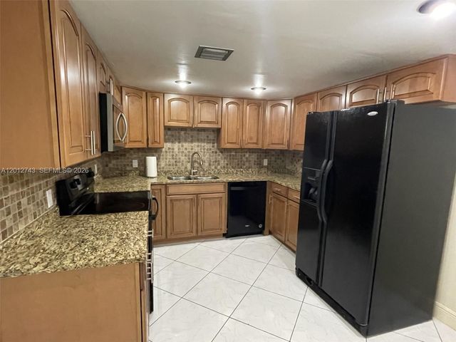 491 Racquet Club Rd 303, Weston, FL 33326