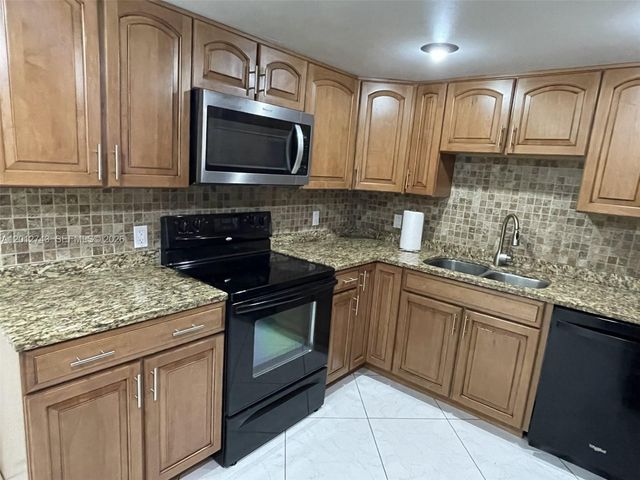 491 Racquet Club Rd 303, Weston, FL 33326