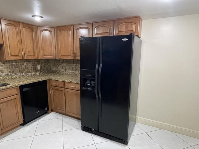 491 Racquet Club Rd 303, Weston, FL 33326