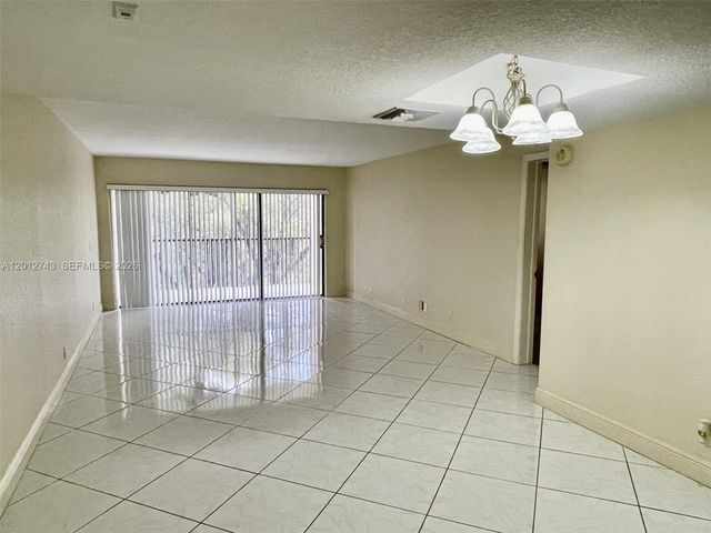 491 Racquet Club Rd 303, Weston, FL 33326