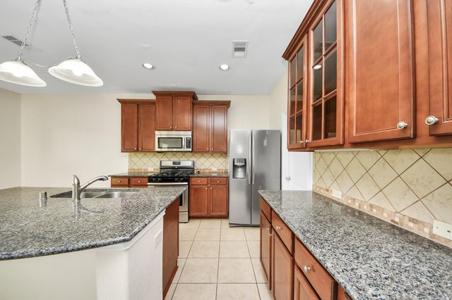 23906 W Fairport Harbor Lane, Richmond, TX 77407