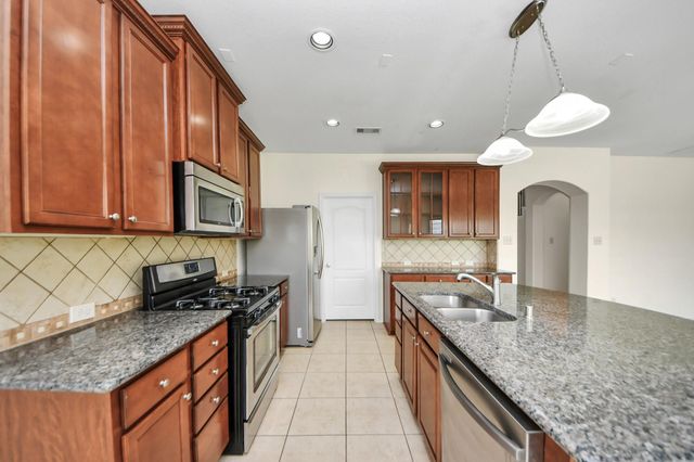 23906 W Fairport Harbor Lane, Richmond, TX 77407