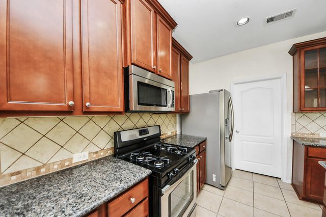23906 W Fairport Harbor Lane, Richmond, TX 77407