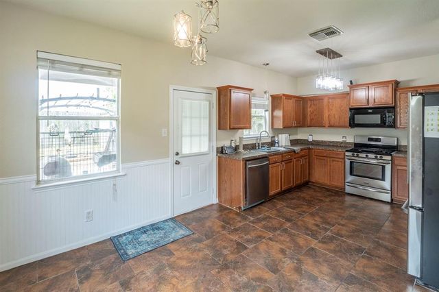 3911 Falvel Cove Drive, Spring, TX 77388