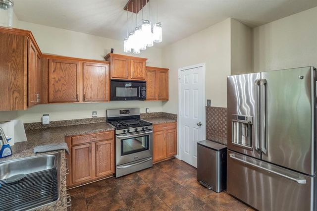 3911 Falvel Cove Drive, Spring, TX 77388