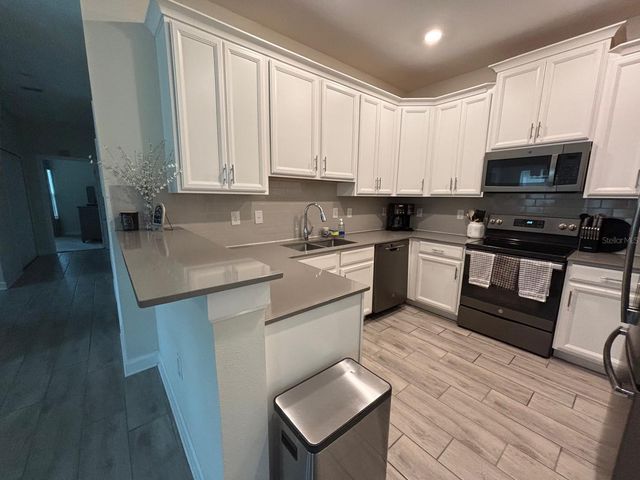 1119 TRAPPERS TRAIL LOOP, Davenport, FL 33896