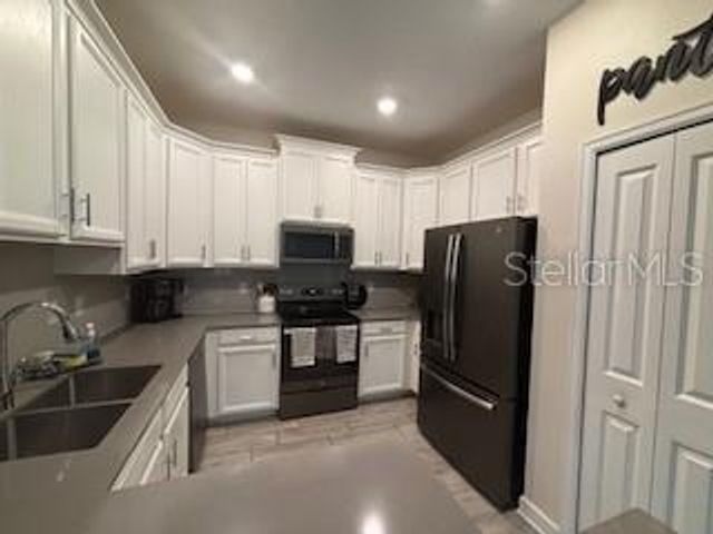 1119 TRAPPERS TRAIL LOOP, Davenport, FL 33896